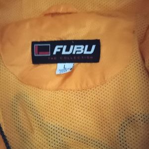 FUBU RAINCOAT , SIZE LARGE BUT VERY ROOMY. CHUNKY BLACK ZIPPER, SNAP POCKETS.